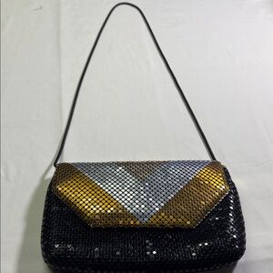 Stylish Black and Gold Handbag
